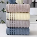 Thick waffle weave cotton face towels in a set of four Morandi colors with Fas ribbon - Soft Brown
