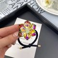 Black high-elastic hair tie featuring a sparkling crystal flower and gold buckle - Large / Volcano Color