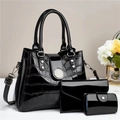 Three-piece set featuring glossy crocodile-embossed tote, clutch, and card holder - Black
