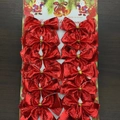12-pack of sparkling red glitter Christmas bows on a decorative display card - 12Pcs (With Card) / Red (Glitter Fabric)