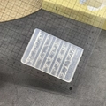 Detailed view of clear silicone nail art mold with floral patterns and measurement ruler - 159-Lotus in Pond
