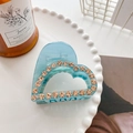 Pinza per capelli a cuore blu traslucido con strass ambra su vassoio bianco - 5.4cm / Blu