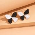 Handcrafted black and white raffia butterfly earrings with gold-plated metal accents - Black and White