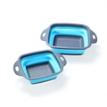 Two square blue and grey silicone collapsible strainers with handles on white background - Large Square / Blue