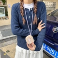 Detailed view of a plush beige mini earphone pouch with a purple woven neck strap - Long Strap Plush Khaki