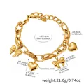 Bracciale dorato in acciaio inossidabile con ciondoli a cuore e fiocco regolabile - Bracciale con Ciondolo Fiocco e Cuore Dorato / 15+4cm / Oro