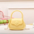 Mini yellow jelly handbag made of PVC with a sleek gold chain strap for crossbody wear - Yellow