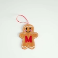 Brown felt gingerbread man ornament with red embroidered letter M and silk ribbon loop - Letter M