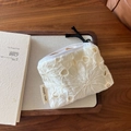 Detail of white cotton lace pouch with floral embroidery and simple wish label - Hollow Out Floral Embroidery