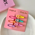Set of 6 colorful macaron dopamine oval metal snap hair clips on a pink display card - Candy Color Oval