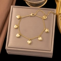Elegant 18k gold plated stainless steel bracelet featuring seven solid heart charms - Seven Hearts Bracelet / Gold