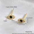 18k gold plated evil eye stud earrings with sparkling zircon on white silk background - Black Zirconia Eye Gold Plated