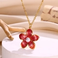 Elegant gold necklace featuring a red enamel flower pendant with a pearl center - Necklace / Garnet Red