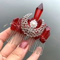Detailed shot of handmade silver hair comb with red crystals and crescent moon charm - Hair Comb / Dark Red