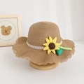 Detailed view of children's straw sun hat with cute sunflower and lace trim - Hat / Coffee