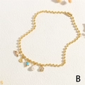 Collar de cuentas doradas con colgantes de cola de pez, corazón, gema azul y perla - Estilo B-Cola de Pez LOVE Corazón Perla