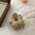 Matte beige camellia flower hair clip with minimalist petal design on soft background - Acrylic Matte Flower Hair Claw / Beige