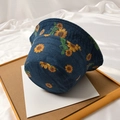 Dark blue denim bucket hat featuring bright yellow sunflower prints for sun protection - Sunflower Denim - Navy Blue