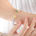 Silver twisted cable open bracelet with gold accents and light blue zircon stones - Z235-Sea Blue Zirconia Double Layer