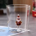 Christmas tree glass cup featuring a colorful 3D Santa Claus figure inside a clear base - Santa Head