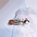 Macro view of Christmas hair clip featuring cute reindeer, tree, snowman and penguin decor - Hair Clip Style B (Elk/Tree/Snowman/Penguin)