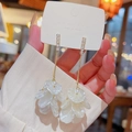 Elegant gold long tassel earrings with translucent layered resin petals and zircons - White Resin Petal Gold Tassel (E0425)
