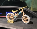 Mini beige plastic balance bike keychain model with yellow accents and white tires - Large/Green Base / Green Base Bike