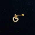 Macro detail of gold heart-shaped stud earring with cubic zirconia on black velvet background - Gold - Heart