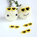 Macro shot of five yellow resin heart-shaped mini sunglasses for DIY crafts and decor - 28*12mm / Yellow & Black