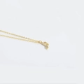 Golden musical note pendant necklace with sparkling white zircons on a fine link chain - Sixteenth Note / Gold
