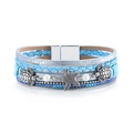 Macro view of blue multi-layer leather bracelet with silver starfish and turtle charms - Sky Blue