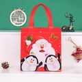 Christmas non-woven gift bag with Santa and penguin print in festive red color - Santa and Penguin
