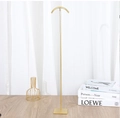 Detail of elegant gold metal display stand with a semicircular hook for jewelry - Large