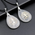 White crystal teardrop necklace with golden tree of life engraving and black cord - White Stone With Black Braided Rope