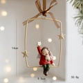 Resin Christmas girl figurine in golden frame ornament with size and weight details - Angel with Red Star