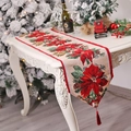 Christmas table runner with red poinsettia floral patterns and elegant red tassels - Christmas Flower Style