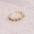 Detail of adjustable gold ring with rainbow cubic zirconia on a natural stone surface - Adjustable Open / Rainbow Baguette Zirconia Style (5#)