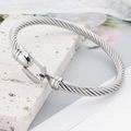 Silver horseshoe buckle cable bracelet made of vintage stainless steel on stone - Steel