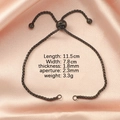 Detailansicht der Maße des verstellbaren schwarzen Bolo-Armbands Länge 11,5 cm Dicke 1,8 mm - 1.8x11.5cm / Schwarz