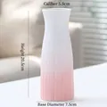 Modern white and pink gradient ceramic vase with vertical striped relief texture - Fanmu (Pink) 21cm