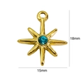 Dettaglio di un ciondolo a stella polare dorata da 18mm con cristallo blu centrale - 7006 Stella in Zirconia Verde