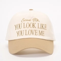 Detailed close-up of brown embroidered text on a cream and khaki cotton baseball cap - One Size / Off-White/Dark Khaki