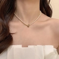 Double-layered gold chain necklace with small white pearls and a heart pendant - Gold Double Heart