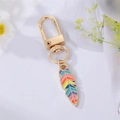 Detail of colorful enamel feather charm on golden alloy keychain with nature props - Colorful Enamel Small Feather / Multicolor/Gold