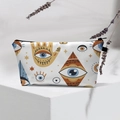Detail of waterproof evil eye makeup bag featuring mystic patterns and black zipper - White Mystic Hand Eye