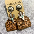 Detail of western earrings with cactus turquoise inlay and brown embossed leather tags - Brown Embossed Leather
