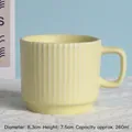 Pale yellow striped ceramic mug with square handle and 260ml capacity on lace cloth - Milky Yellow