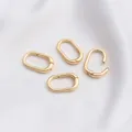 Makroaufnahme von 14K Gold gefüllten ovalen Federringen für DIY Schmuckherstellung - 14K Gold Oval Federring 20x12mm