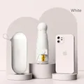 Mini portable creamy white UV sun umbrella with hard case showing phone size comparison - Off-White + Capsule Box