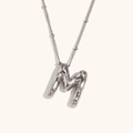 Minimalist silver puffed balloon letter M pendant necklace in high polished stainless steel - Steel-M